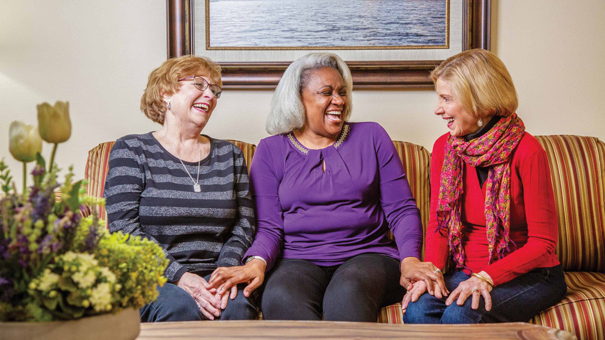 The Carriage House residents on couch