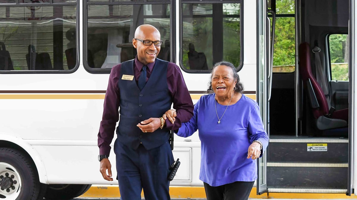 The Carriage House residents on bus